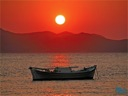 Milos island - Boat in Sunset
